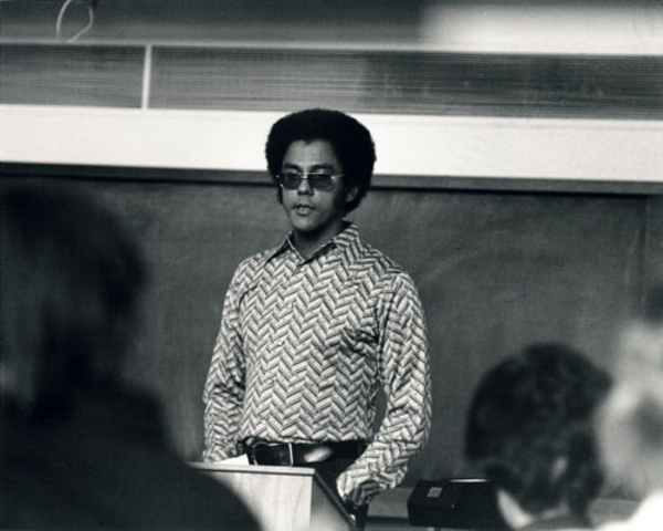 Warren lecturing a class