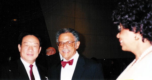 Warren and Mary Washington with Dr. Zhou, the President of the World Meteorological Organization.