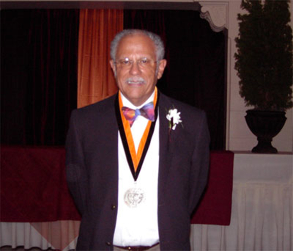 Warren with his Honorary Doctorate Medal from Oregon State University.