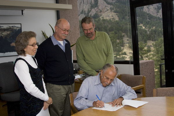 Warren gifting his papers to NCAR