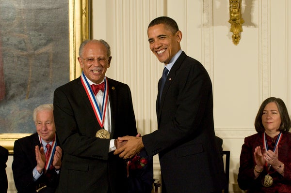 President Barak Obama and Warren Washington shaking hands