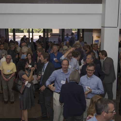 Attendees mingle during the re-dedication reception.