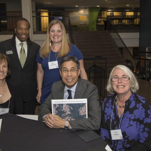 Valerie Sloan, Tim Barnes, Becca Hatheway, Sandi Pei, and Lucy Warner. Sandi Pei holds his copy of An Architectural Masterpiece which was updated and reprinted in honor of the anniversary. 