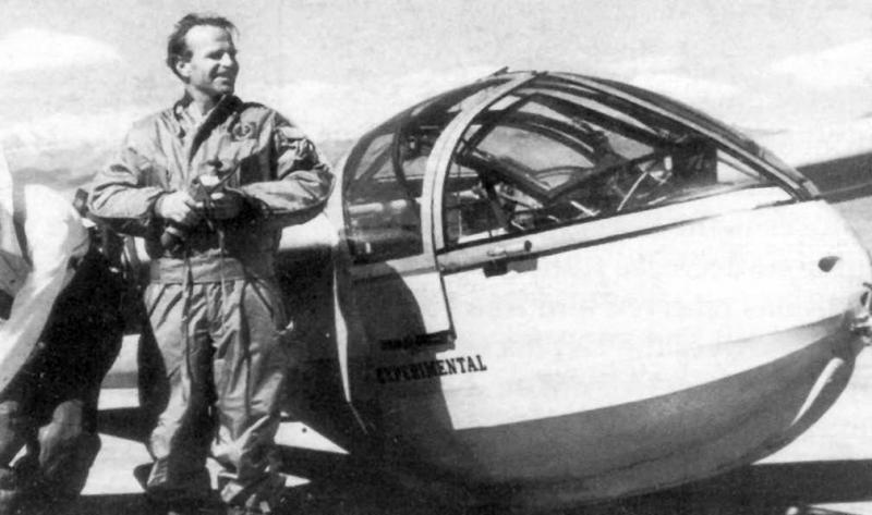 Joachim Kuettner standing next to a glider.
