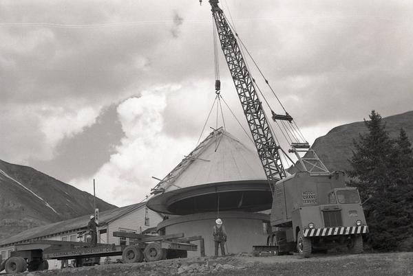 Climax Observatory dome placement during construction. 