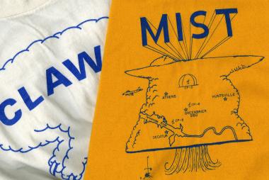 Two t-shirts with the front artwork visible. The shirts are from the CLAWS (Classify, Locate, Avoid Wind Shear) and MIST (Microburst and Severe Thunderstorm) projects. The designs on the shirts include the project acronyms and depictions of microbursts and observational equipment.